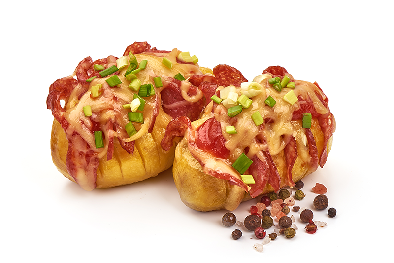 Baked potato with bacon, cheese and onion
